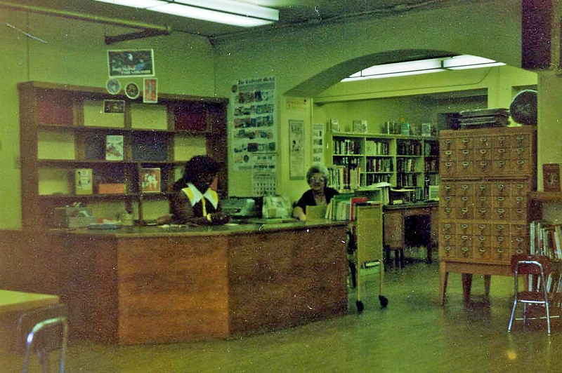 Children's Room with Children's Librarian Mrs. Harris (left), 1970s